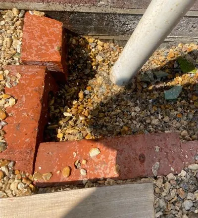 Drainage engineer carrying out a drain unblock
